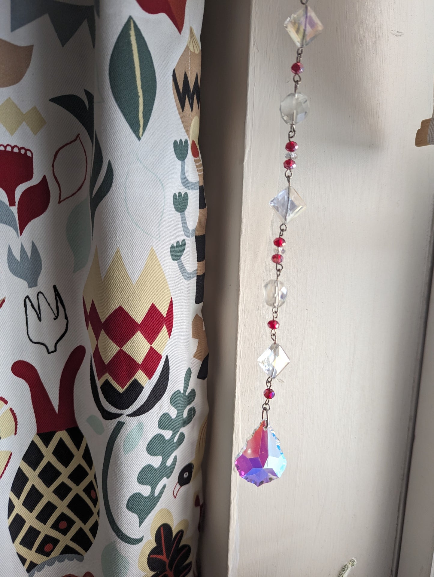 Atrapasol de diamantes (rojo o azul)