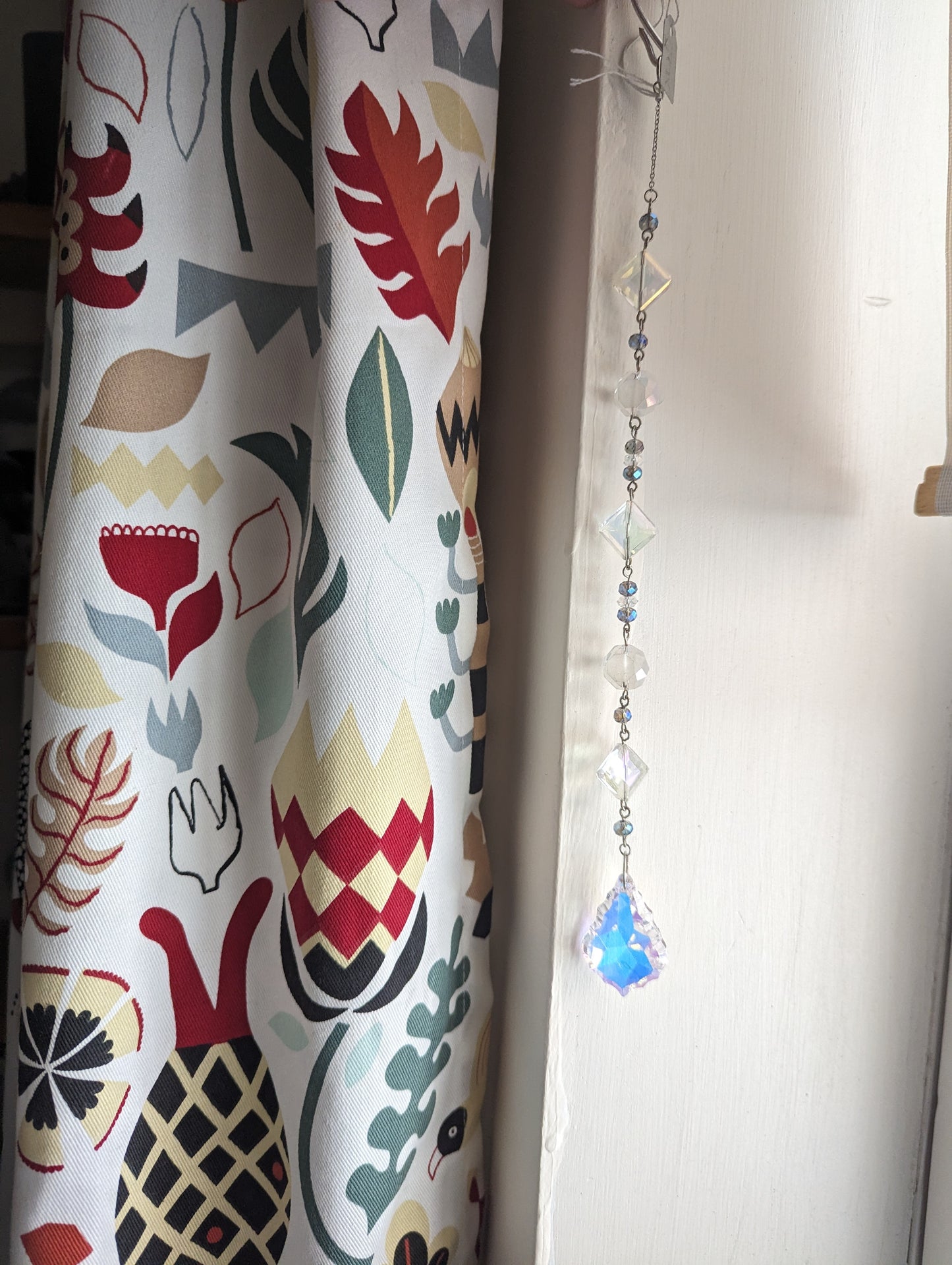 Atrapasol de diamantes (rojo o azul)