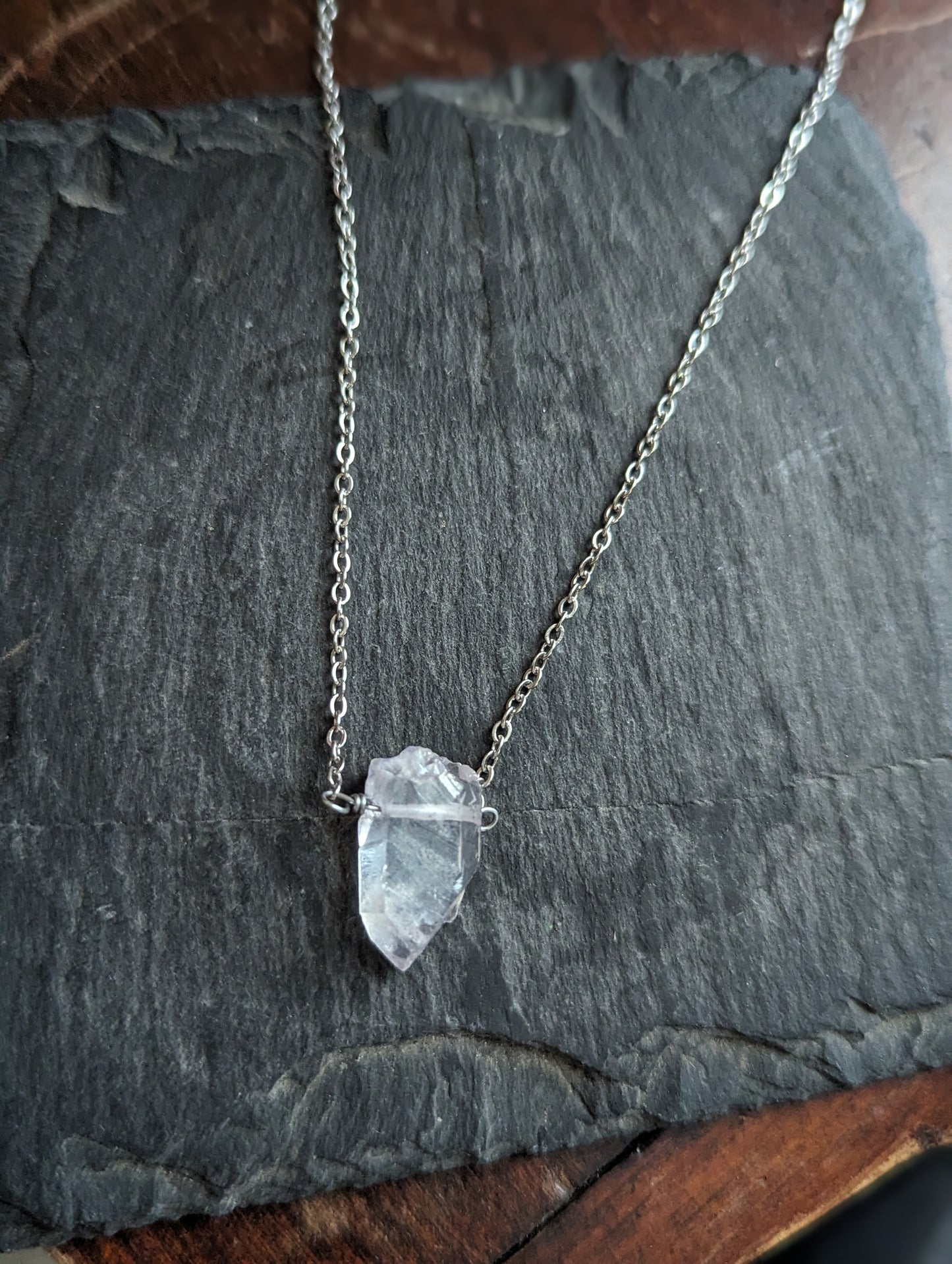 Purple Quartz Crystal Point on Stainless Steel