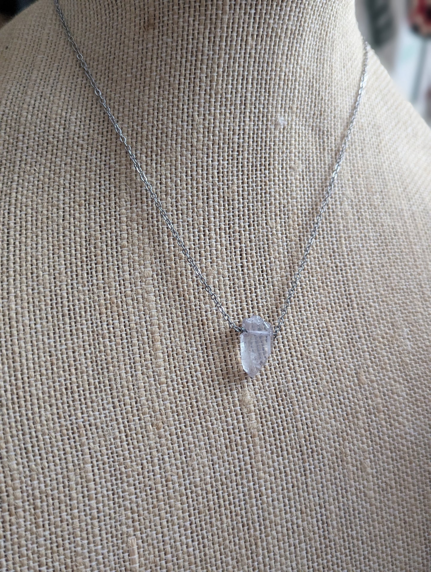 Purple Quartz Crystal Point on Stainless Steel