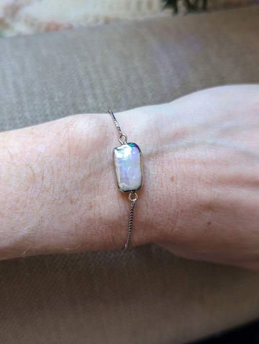 Pulsera deslizante de plata con perlas de agua dulce