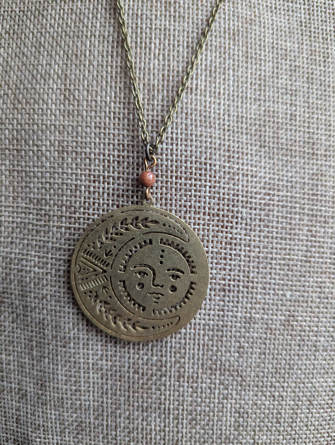 Brass Sun and Moon Red Goldstone Long Necklace