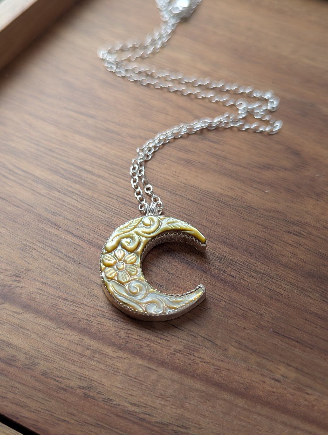 Carved Mother of Pearl Crescent Moon Sterling Silver Necklace