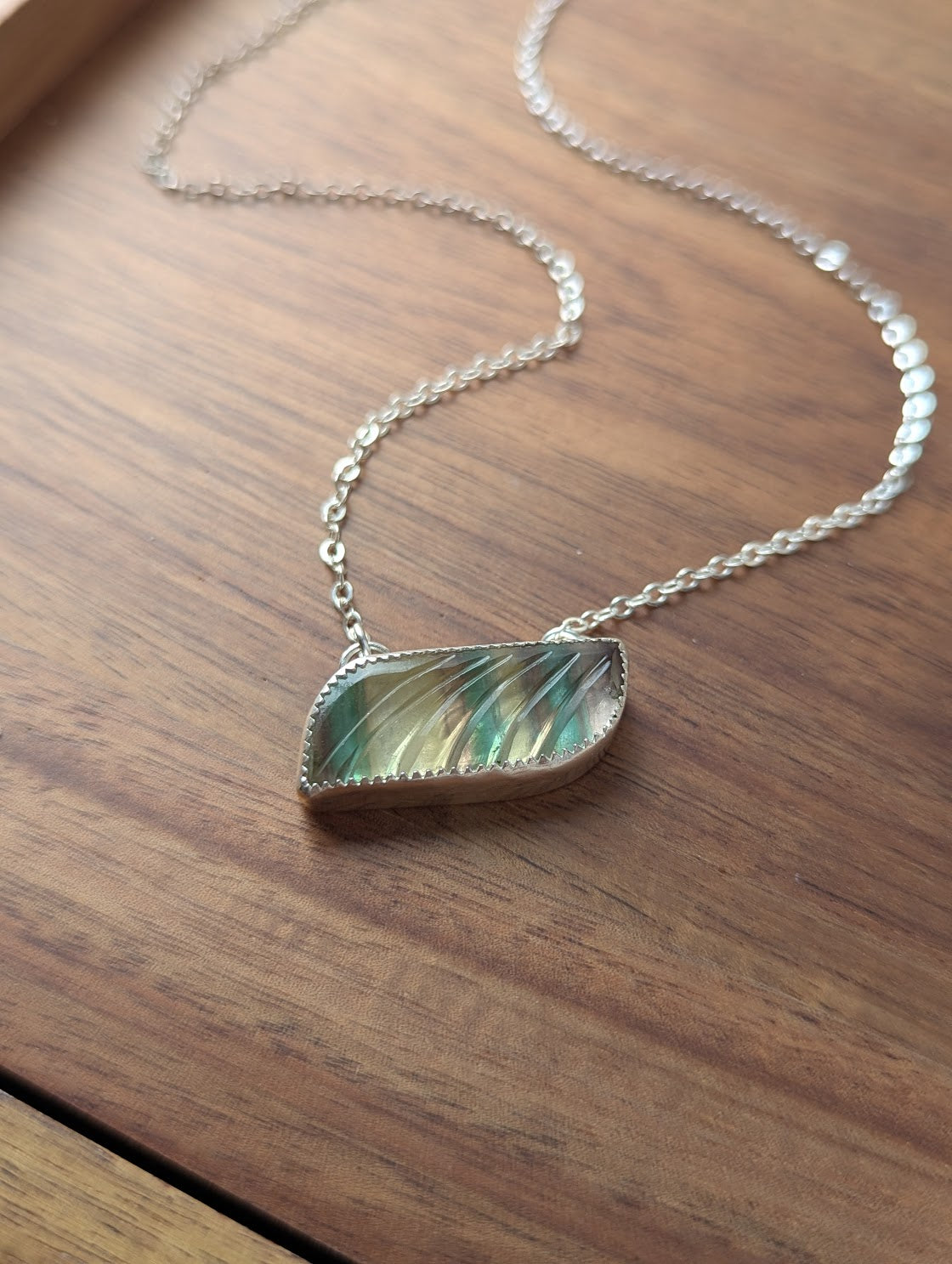 Carved Rainbow Fluorite Wave Sterling Silver Necklace