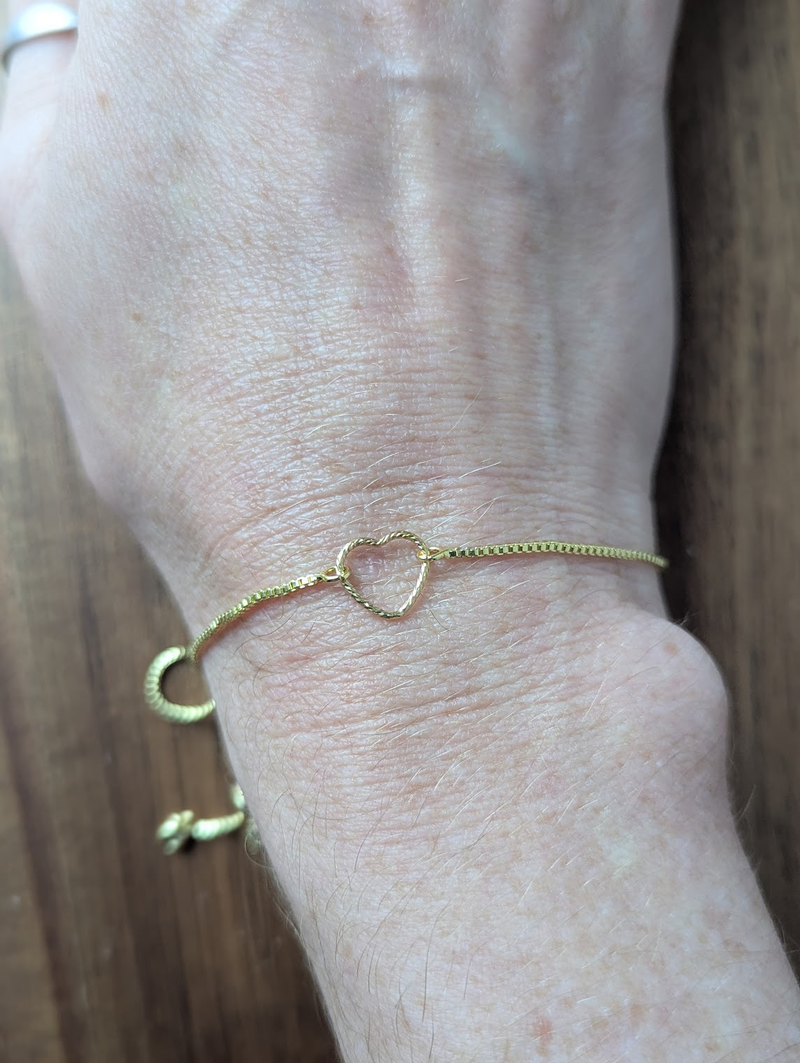 14kGF Twisted Heart Gold Slider Bracelet