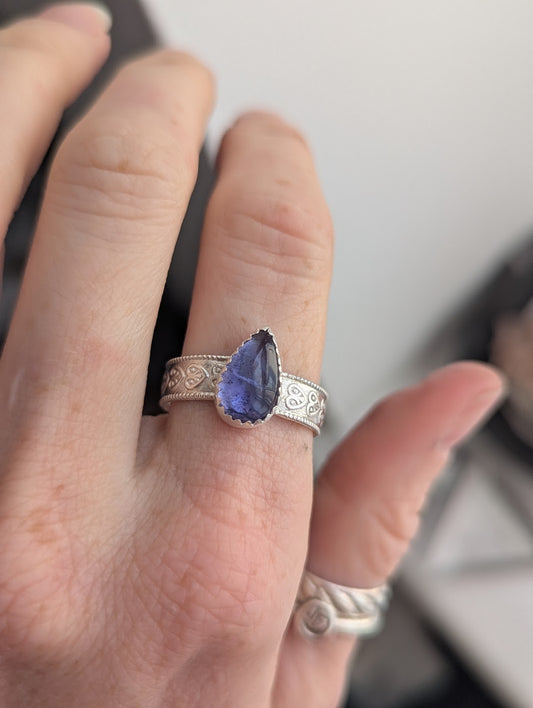 Tanzanite Teardrop with Silver Thick Heart Band - Size 9