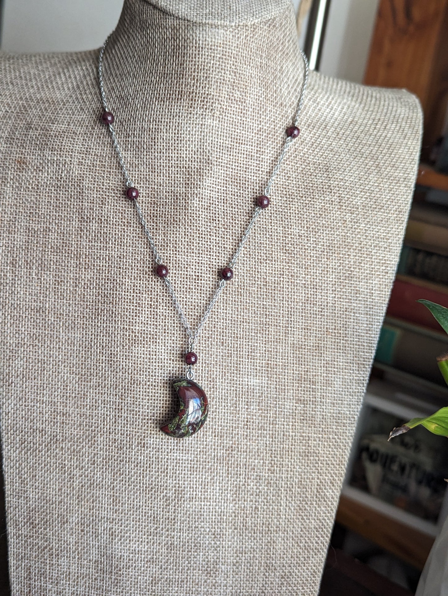 Dragons Blood Crescent Moon and Garnet on Stainless Necklace
