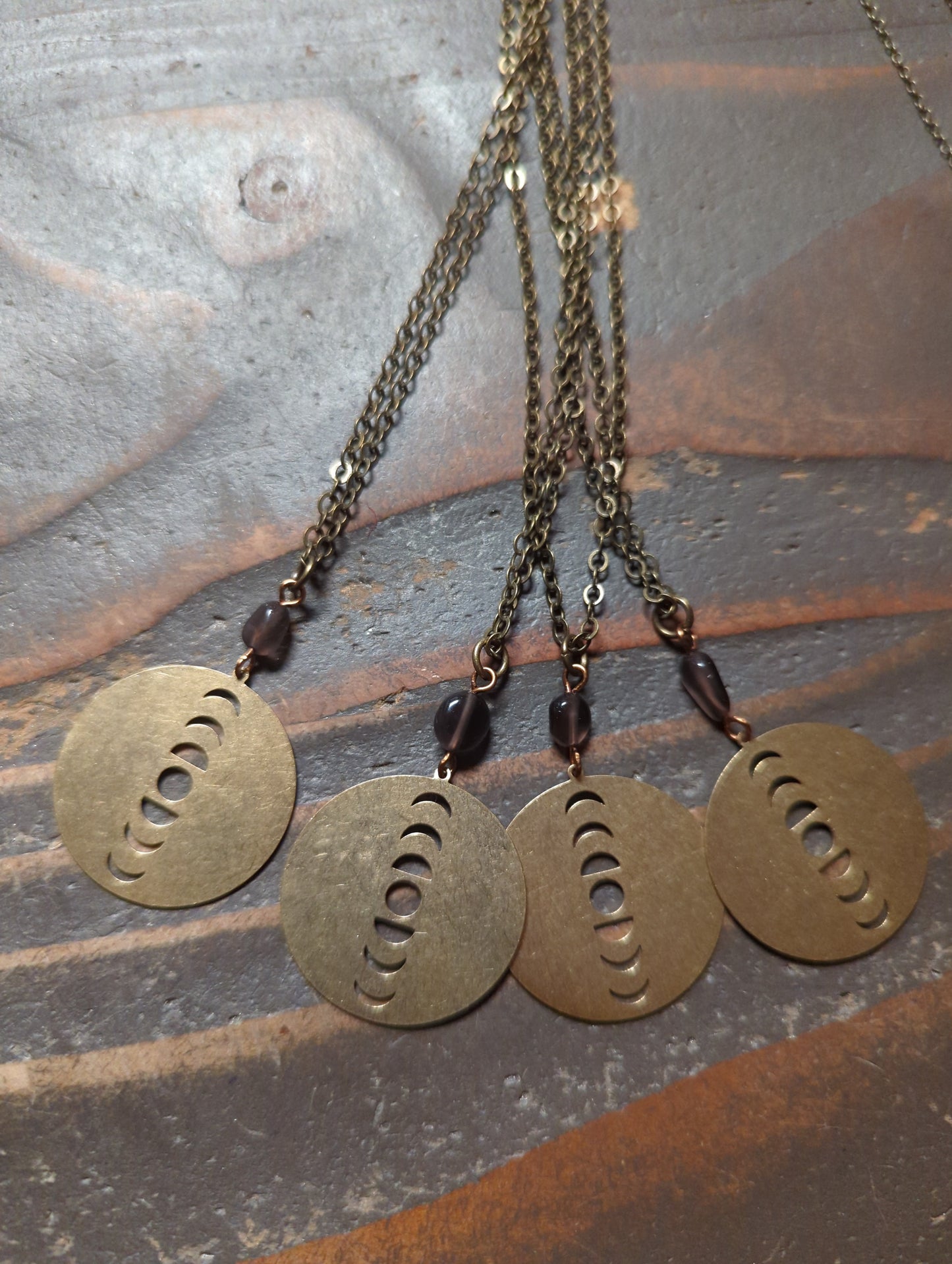 Moon Phase Brass Talisman