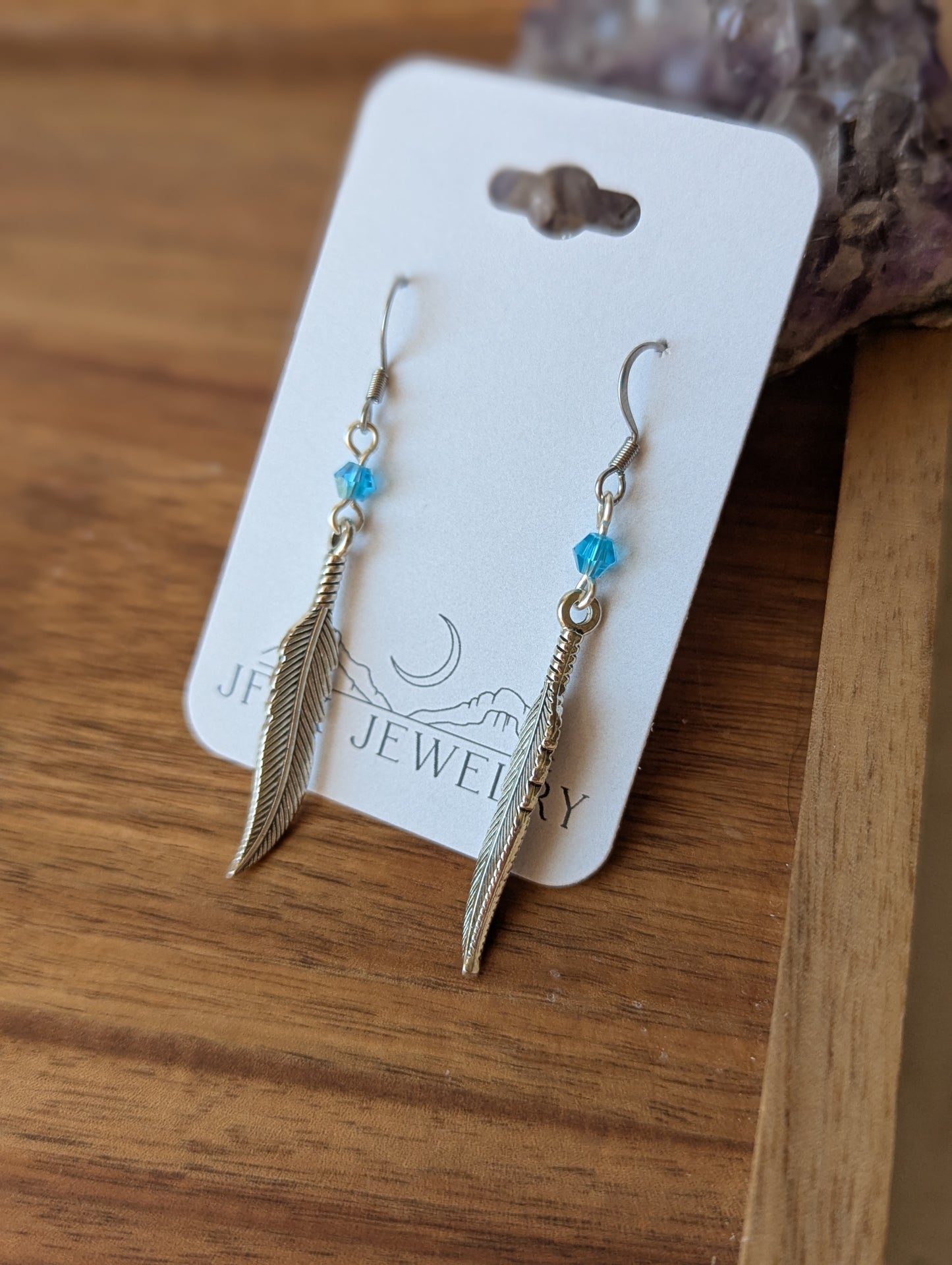 Silver Feather With Blue Accent Bead Earrings