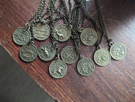 Double Sided Zodiac Brass pendants
