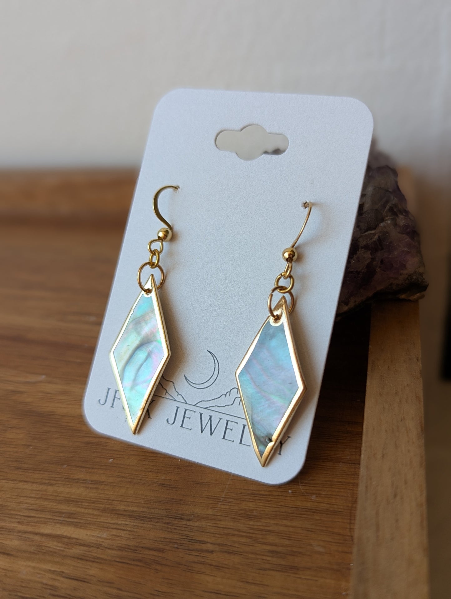 Pendientes de oro con diamantes y concha de labio negro