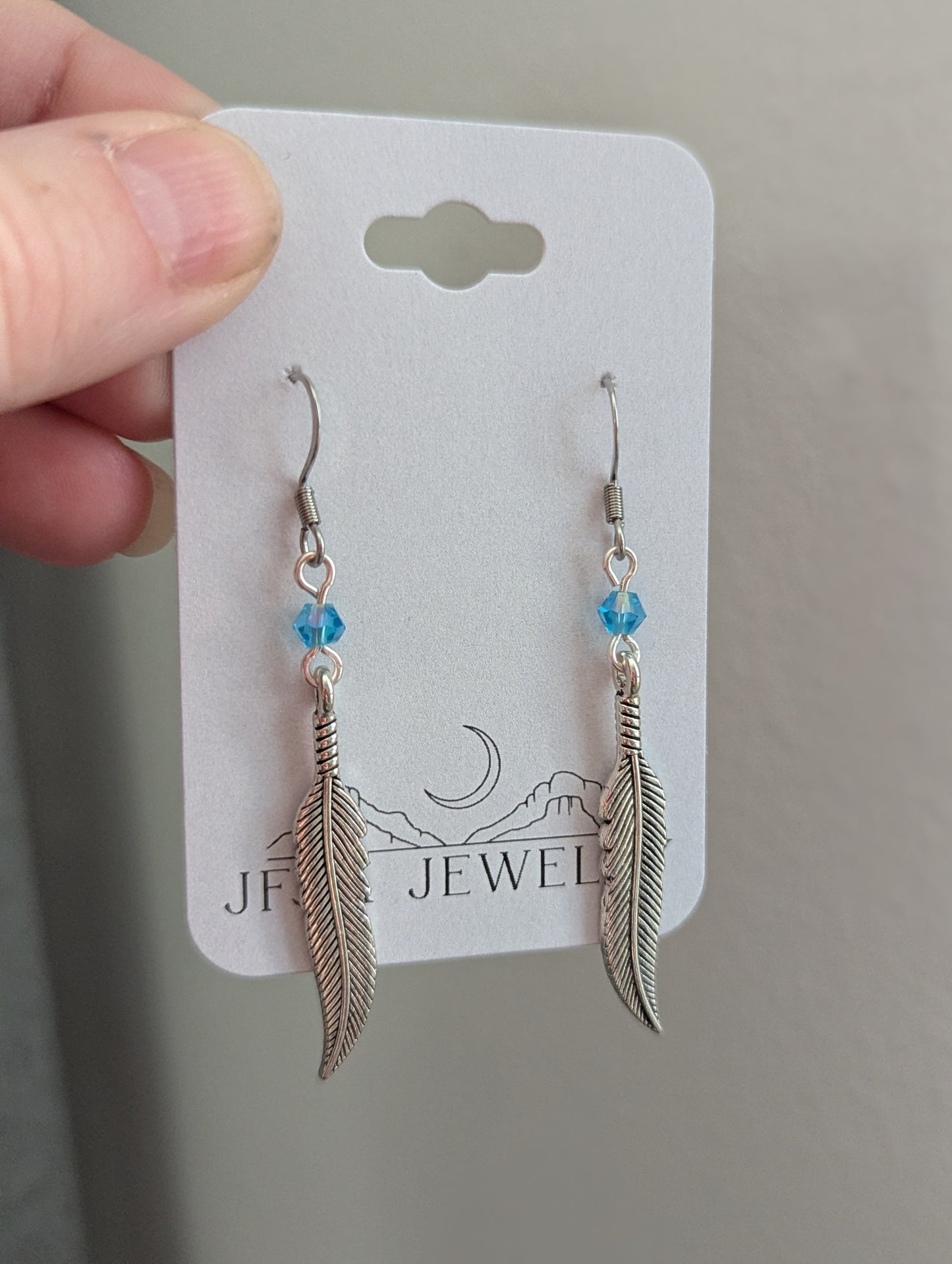 Silver Feather With Blue Accent Bead Earrings