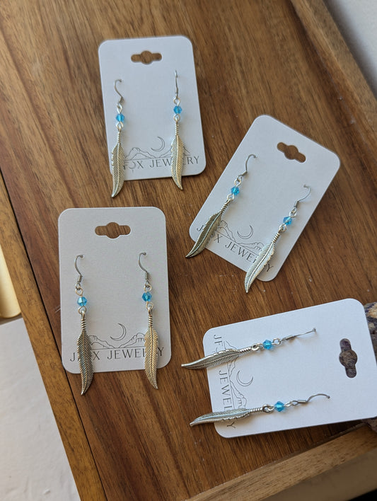 Silver Feather With Blue Accent Bead Earrings