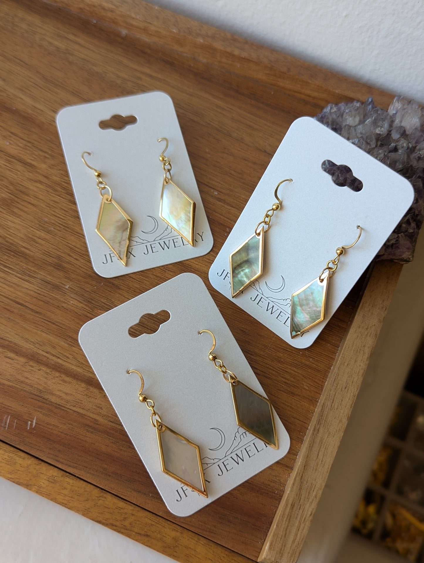 Pendientes de oro con diamantes y concha de labio negro