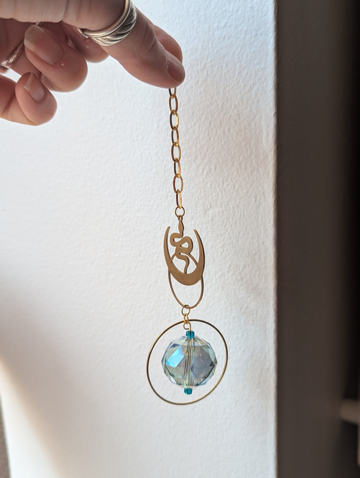 Gold Snake Moon Orbital Suncatcher