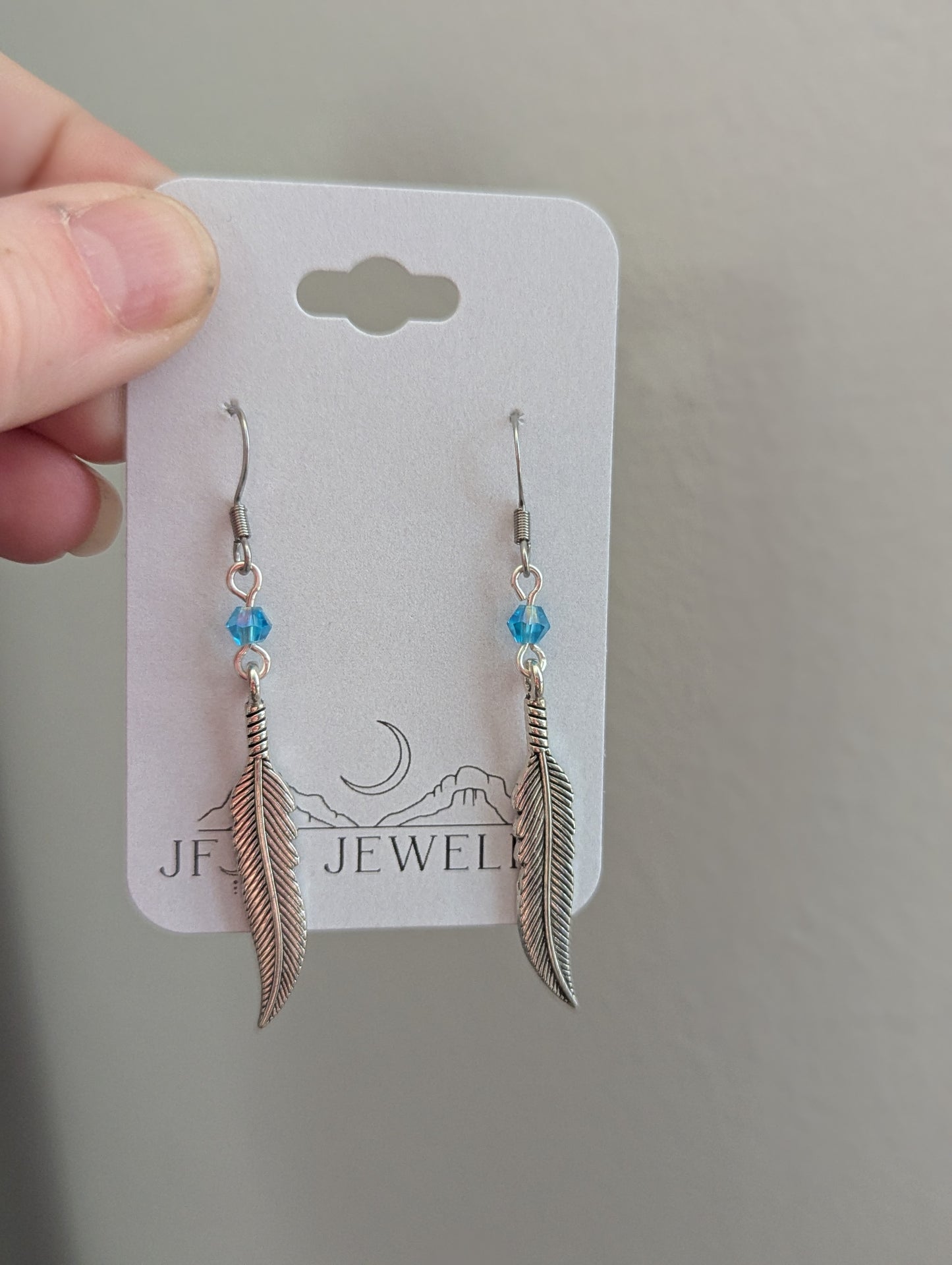 Silver Feather With Blue Accent Bead Earrings