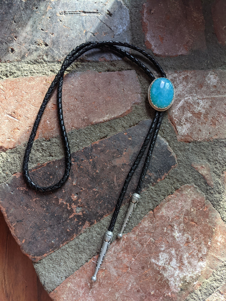 Vibrant Teal Blue Stone and Black Leather Bolo Tie