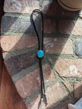 Vibrant Teal Blue Stone and Black Leather Bolo Tie