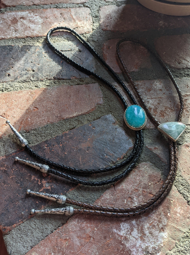 Vibrant Teal Blue Stone and Black Leather Bolo Tie