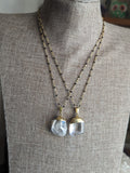 Clear Quartz Pendant on Gold and Black Chain