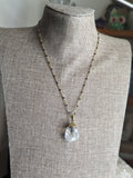 Clear Quartz Pendant on Gold and Black Chain